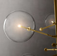 Load image into Gallery viewer, Clear Globe Mobile Six-Arm Chandelier 55"